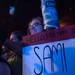 A fan in the crowd holds a sign as Darren Criss takes the stage at the Blind Pig. 
Courtney Sacco I AnnArbor.com